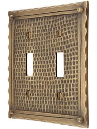 Bungalow Style Double Toggle Switch Plate In Antique Brass.